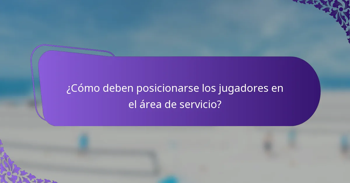 ¿Cómo deben posicionarse los jugadores en el área de servicio?